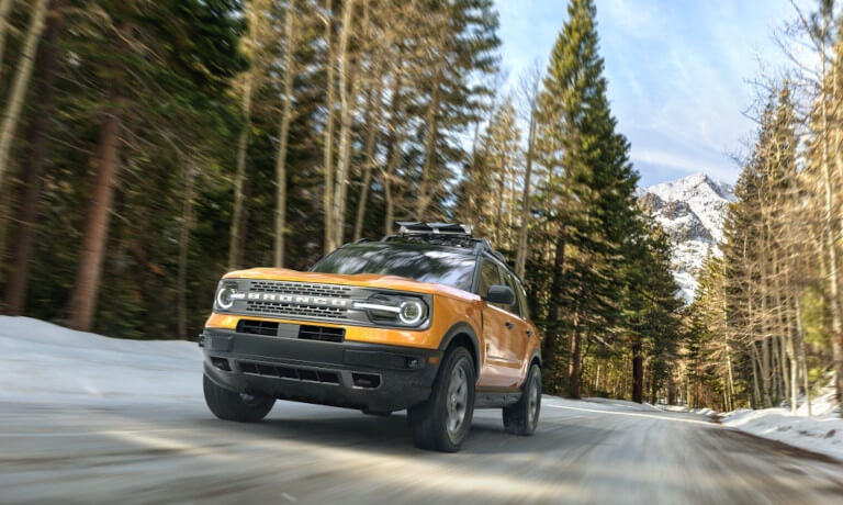 2024 Ford Bronco exterior driving in snowy forest